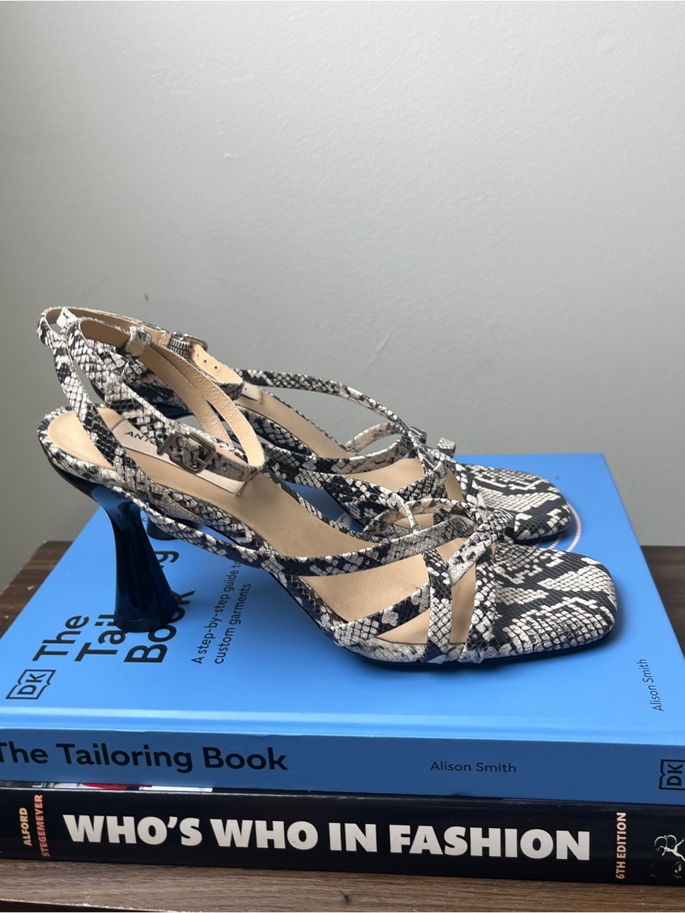 ANTONIO MELANI Snake-Print Ankle Strap Heels in Black and Cream
Size: 8
Heel: 3”